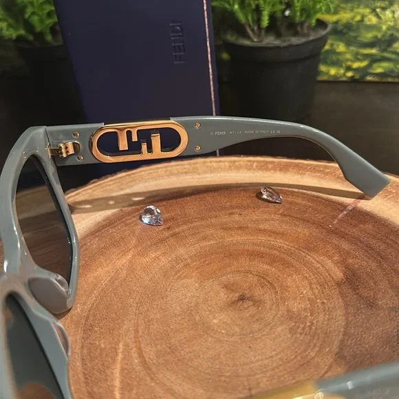 Fendi grayish green 
Sunglasses with Gold Accents - Picture 5 of 9